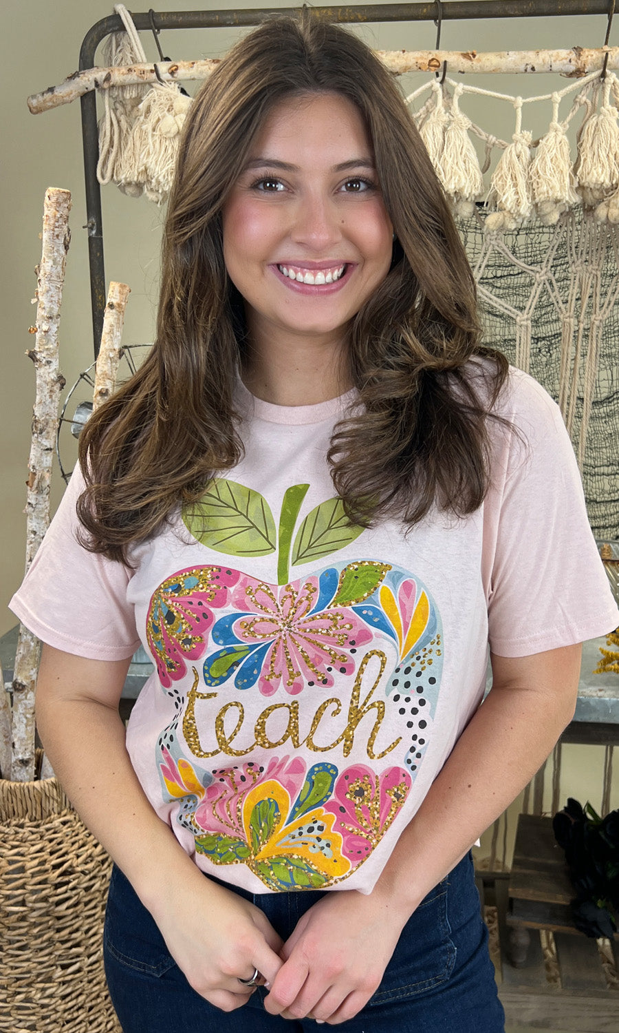Stylish Floral Glitter Apple Teacher Graphic Shirt features vibrant designs, perfect for teachers who love to inspire.