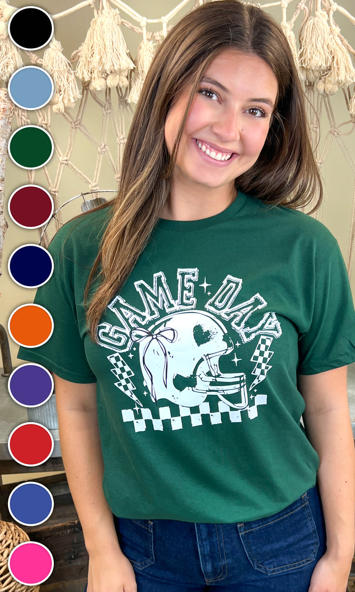 Stylish Game Day Football Bow Graphic T-Shirt on a model, perfect for football fans. Available in multiple colors.