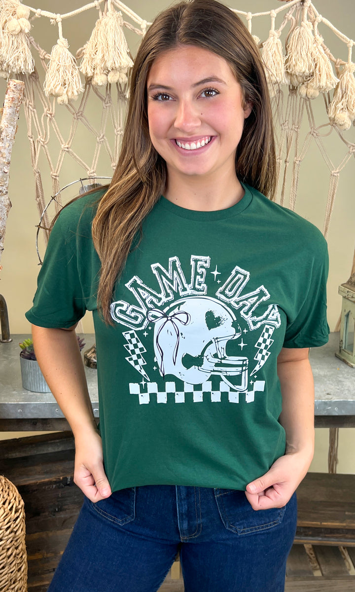 Show off your spirit in the Game Day Football Bow Graphic T-Shirt, perfect for fans celebrating game day.