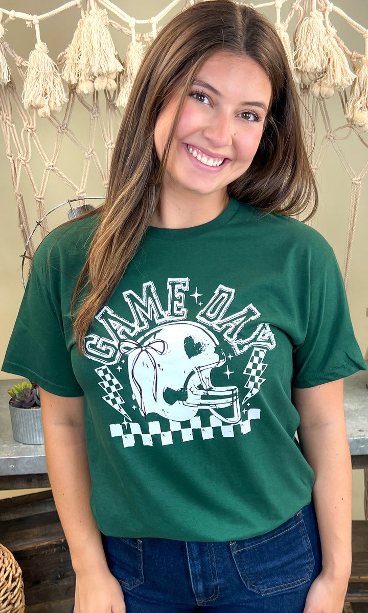 Stylish Game Day Football Bow Graphic T-Shirt features a fun design perfect for football fans. Available now!