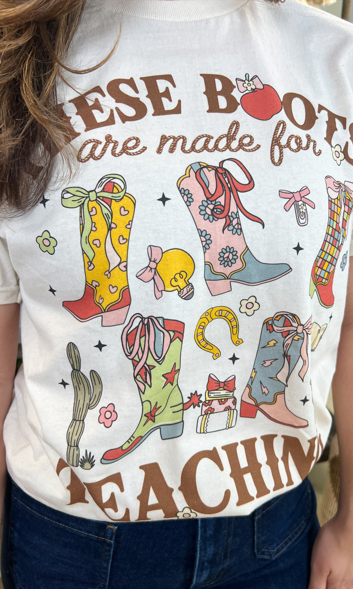 These Boots Were Made For Teaching Graphic Shirt features colorful cowboy boots and playful designs for educators.