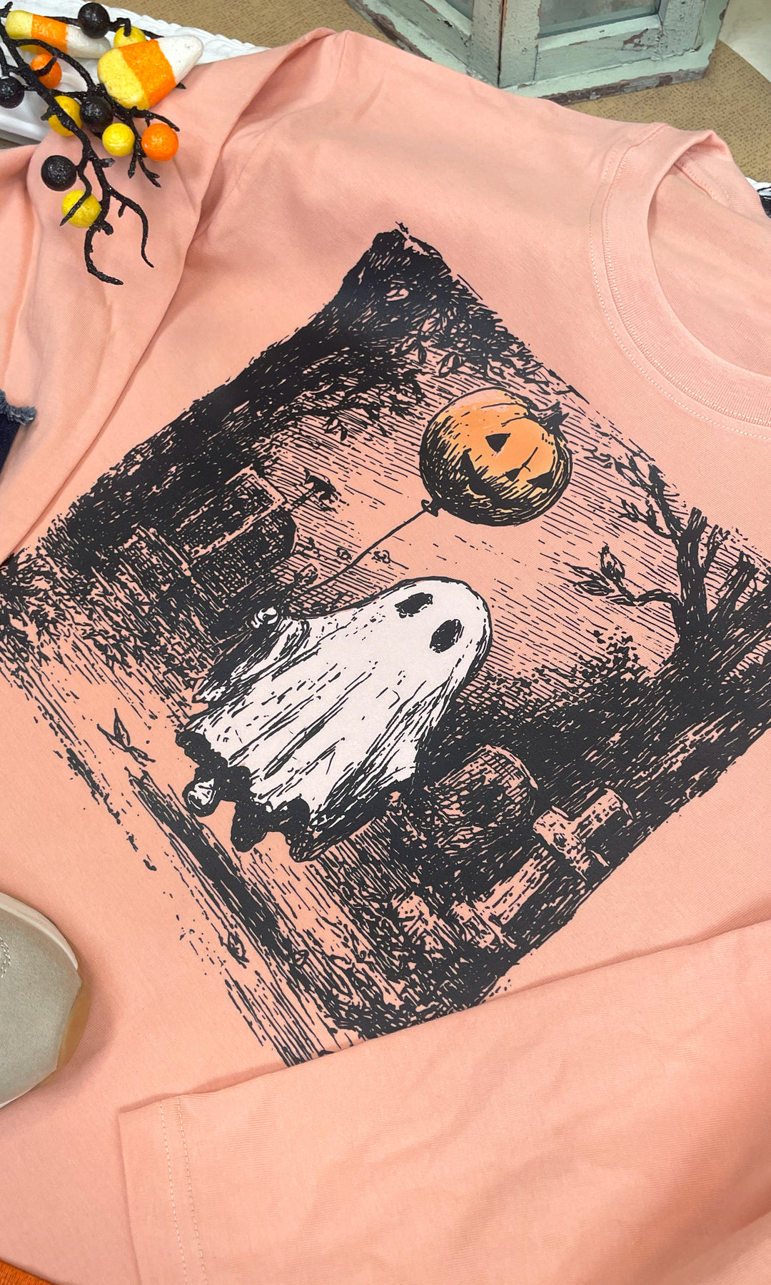 Vintage Ghost Balloon Halloween Graphic Long Sleeve T-Shirt by Tees2urdoor in blush with a ghost balloon design.