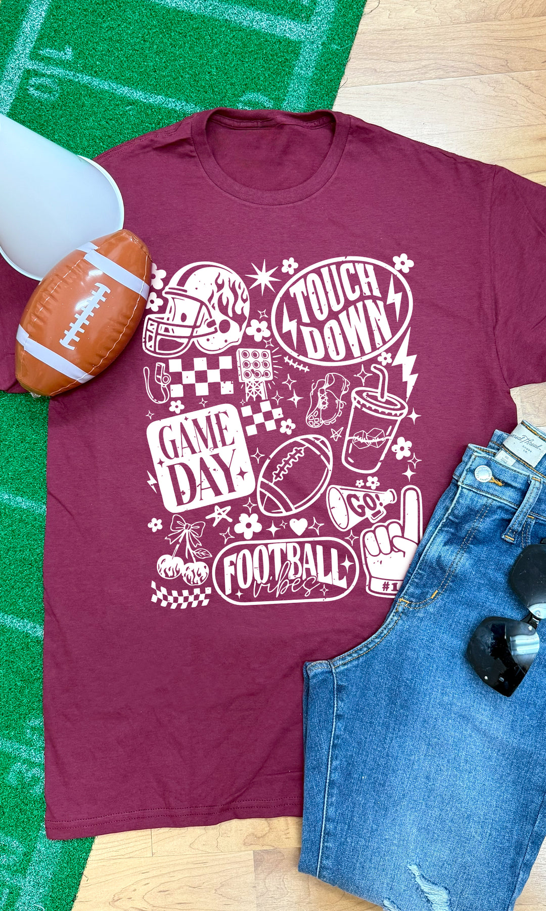 Stylish Vintage Football Season Graphic T-Shirt in maroon, perfect for game day vibes and football enthusiasts.