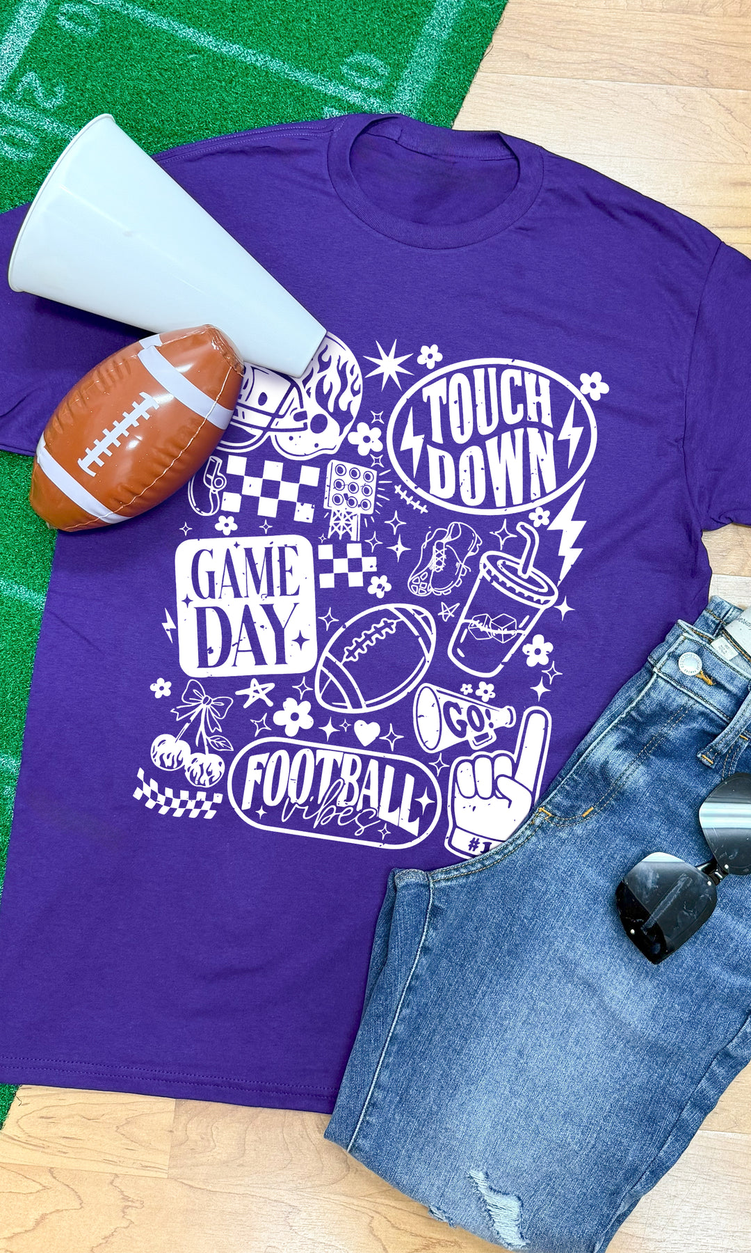 Vintage Football Season Graphic T-Shirt in purple showcases fun football-themed designs for game day vibes.