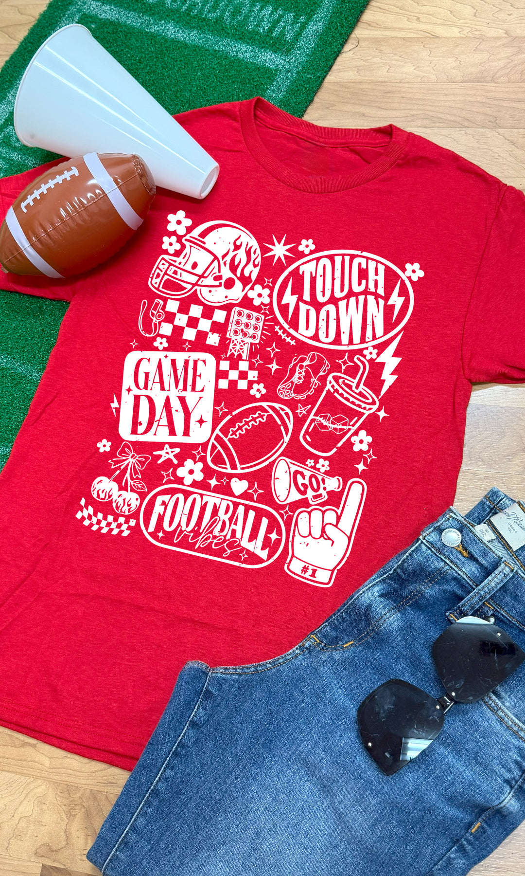 Vintage Football Season Graphic T-Shirt in red, perfect for game day style with fun football-themed graphics.